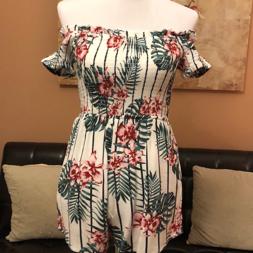Floral off the shoulder romper.